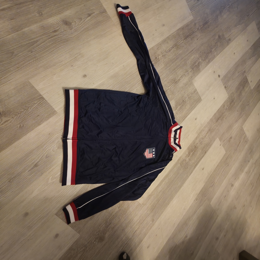 Navy Zip-Up Sweater with Red and White Accents